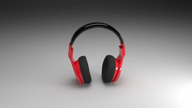 Image d’illustration : un casque audio rouge sur fond gris.